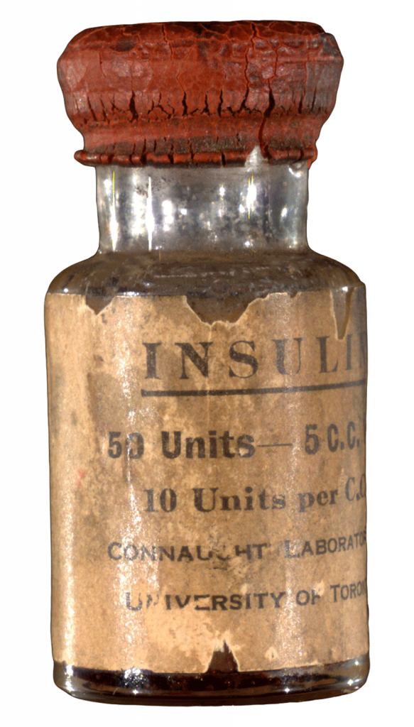Bottle of insulin with beige label printed in black and red rubber stopper