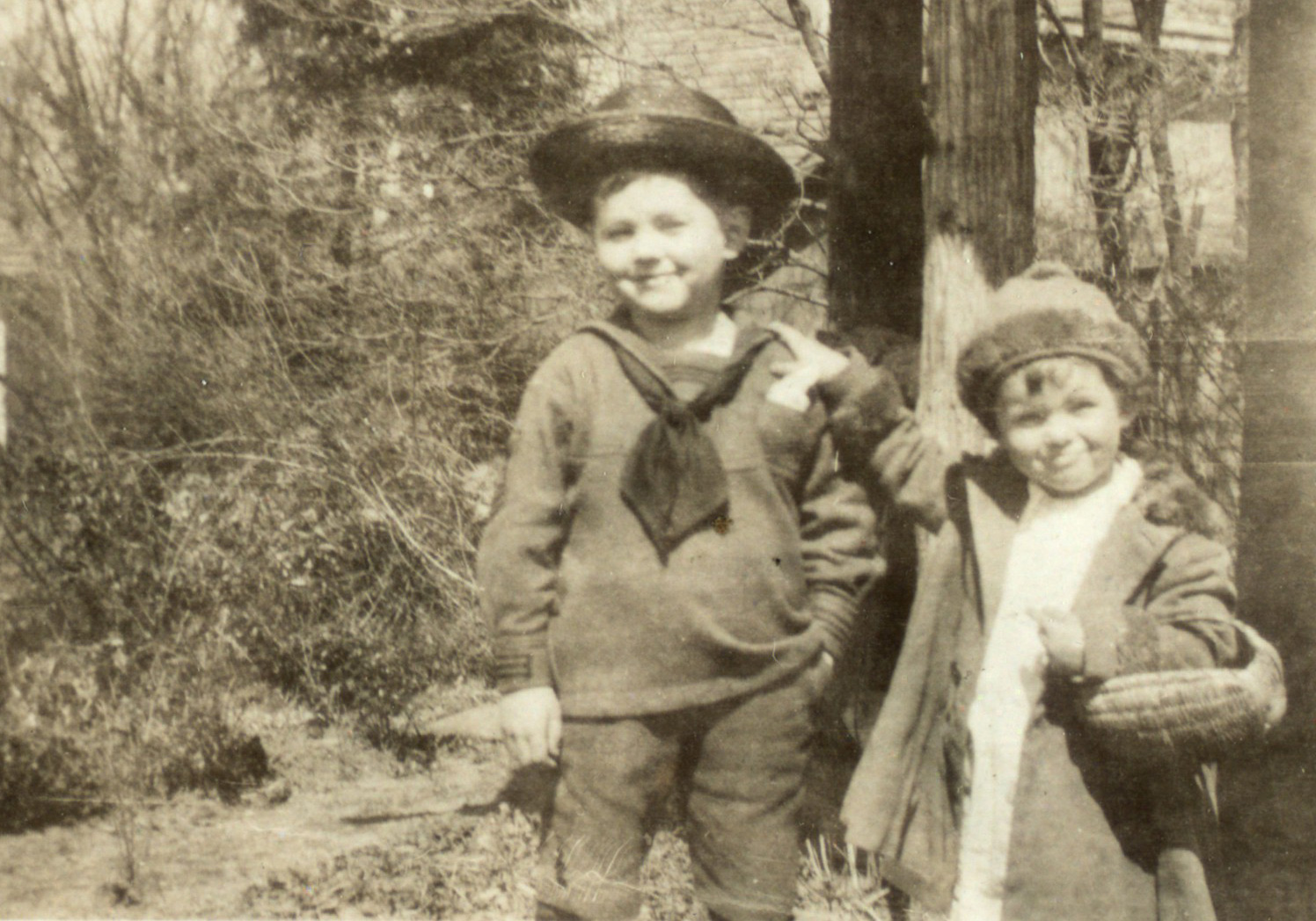 A 1923 photograph shows a healthy and smiling Teddy Ryder with his younger sister Margaret, with her hand on his shoulder.